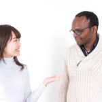 alt="英語スピーキングをする女性"